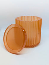 Load image into Gallery viewer, Orange handmade resin jar with a ribbed design. 
